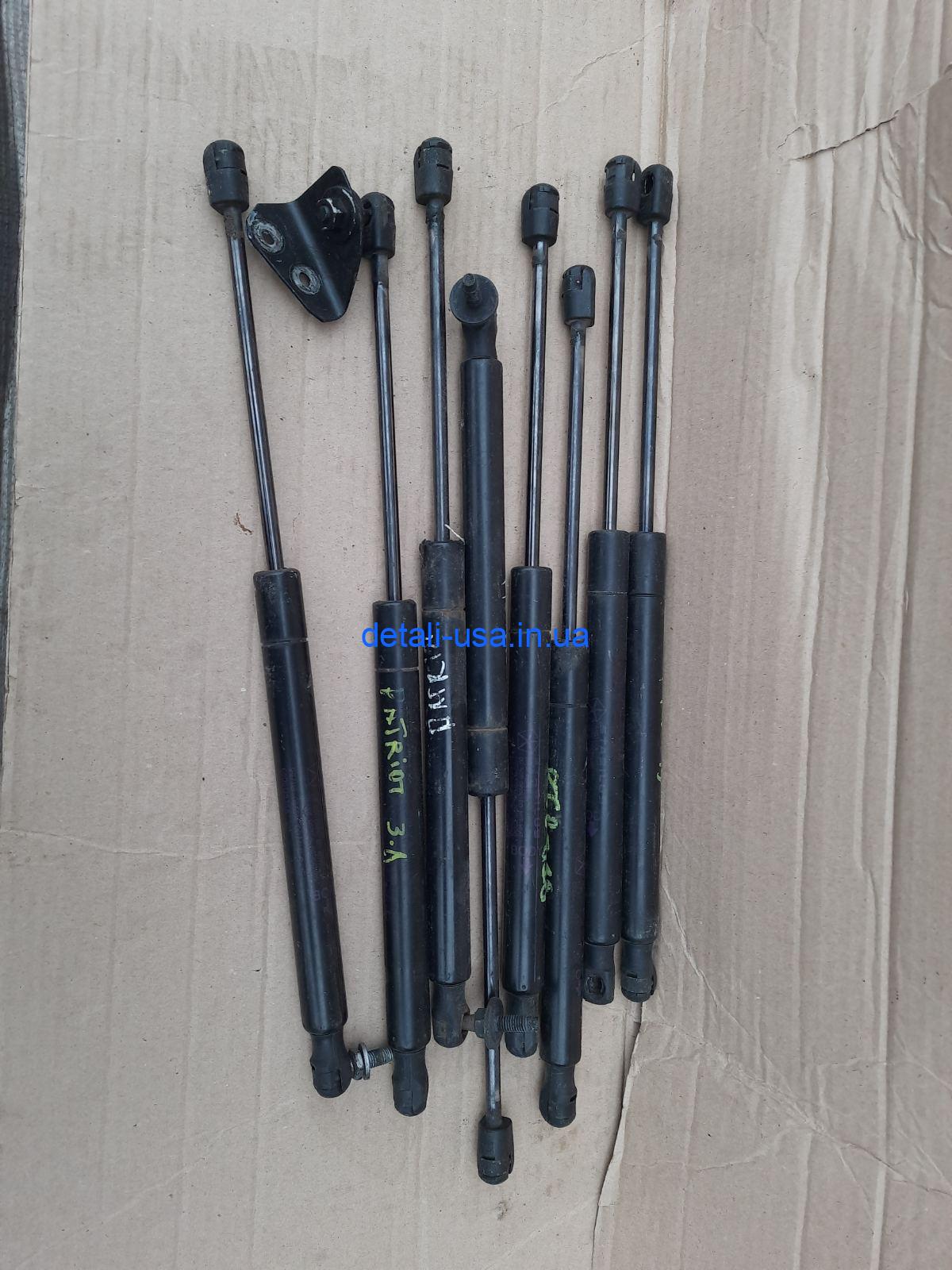 0-04-05-aed65c6ce69bd75cf69af0a347def724f0318d63623af4283028e212a94581e1_4d8047c330997012 Амортизатор двери багажника jeep patriot, 68061353AA