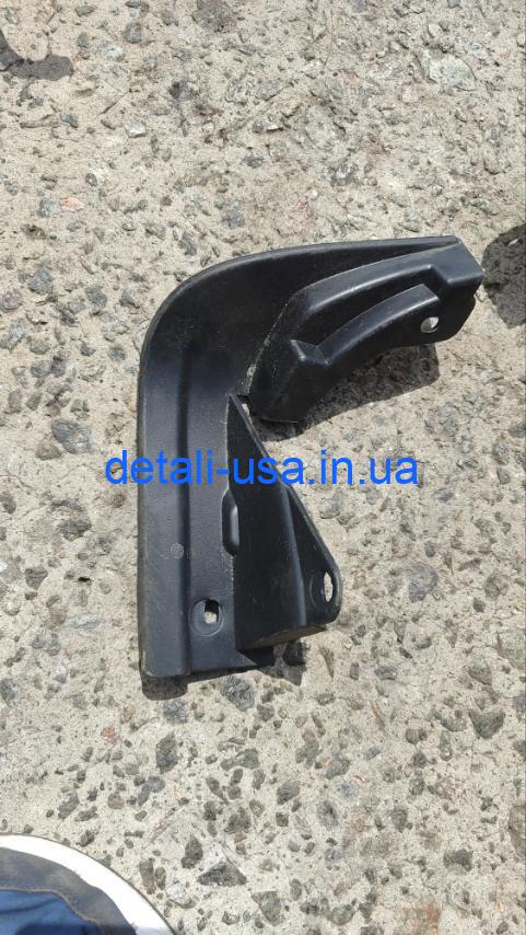 Брызговик колеса правый FORD D2BB8102AA Брызговик колеса правый FORD D2BB8102AA